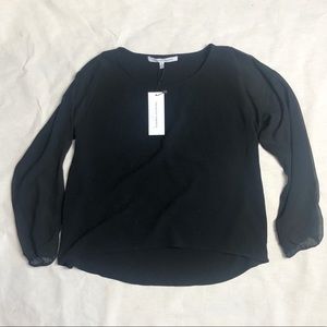 Versatile black blouse w/shear sleeves